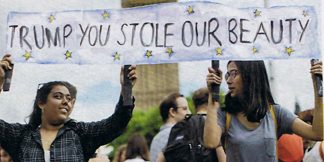 Fake Protest banner of dark women in London vs Trump